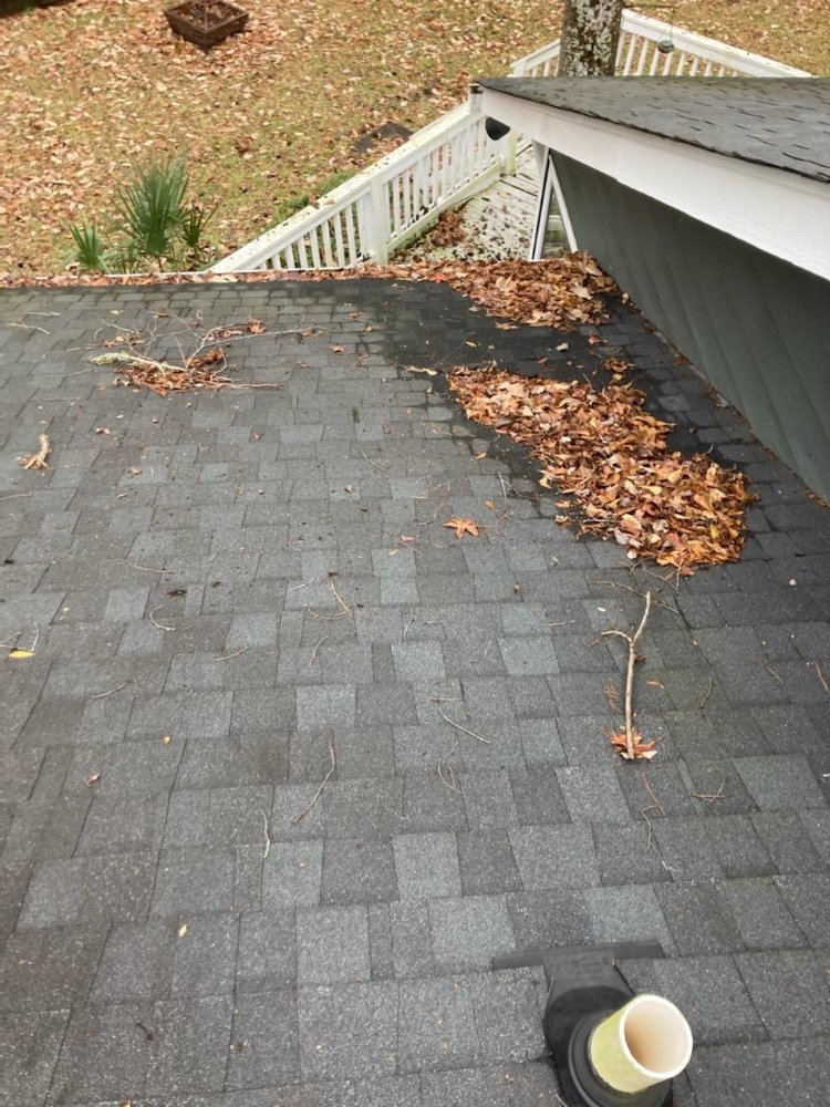 Slide of Roof and Gutter Cleaning