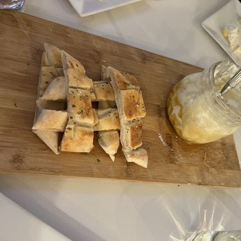LaScala’s Fire - Highly recommend!! The Ricotta Board appetizer!! Whipped ricotta and honey in a pot and delicious toasted bread, almost like a pita or naan. - Pizza Near Me - Villanova, Pennsylvania
