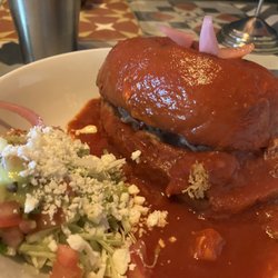 Santo De La Torta - Torta Ahogada- pork carnitas with pickled onions served smothered in guajillo-beer sauce