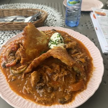 Zapiecek - Potato pancake with goulash - Polish Near Me - Warsaw, MZ Zapiecek - Potato pancake with goulash - Polish Near Me - Warsaw, MZ