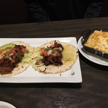 The Row - Brisket tacos and grits - Southern Near Me - Nashville, Tennessee The Row - Brisket tacos and grits - Southern Near Me - Nashville, Tennessee