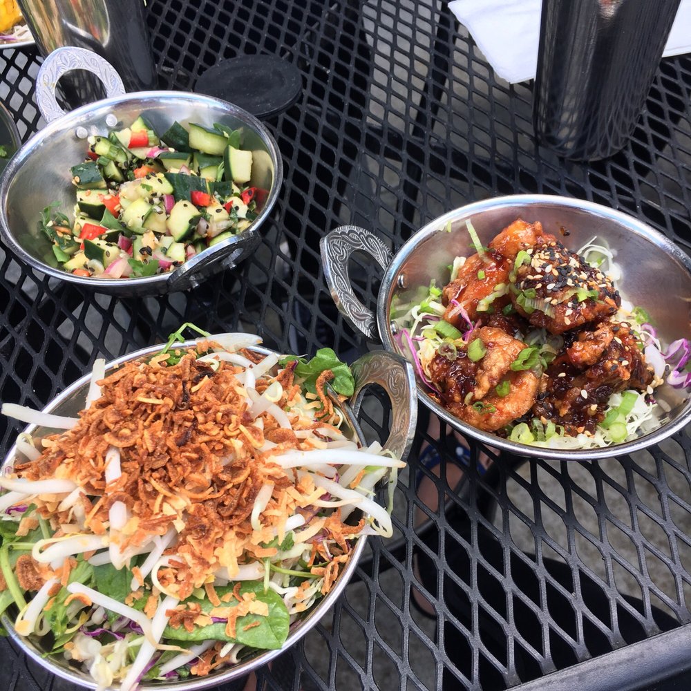 Spork - Side of spicy fried chicken on the right with a side salad on the right. In the top bowl is the cucumber salad. All were delicious! - Mexican Near Me - Bend, Oregon Spork - Side of spicy fried chicken on the right with a side salad on the right. In the top bowl is the cucumber salad. All were delicious! - Mexican Near Me - Bend, Oregon