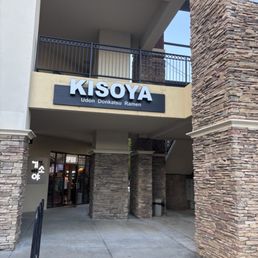 Look for this sign and you'll see the walkway set back for the entrance.