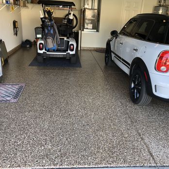 Advanced Painting and Flooring - a golf cart in a garage - Painters Near Me Advanced Painting and Flooring - a golf cart in a garage - Painters Near Me