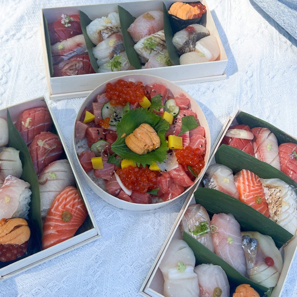 Osakana - Sushi Deluxe (left), Sushi First Class (right), Sushi Tokyo Market Premium (back), and Toro Bento (middle) - Seafood Near Me - New York, New York Osakana - Sushi Deluxe (left), Sushi First Class (right), Sushi Tokyo Market Premium (back), and Toro Bento (middle) - Seafood Near Me - New York, New York