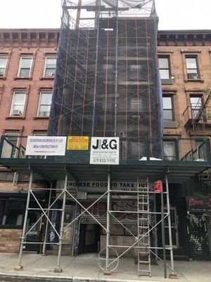 323 Nostrand Avenue, Brooklyn, NY 11216 - Project Location: 323 Nostrand Ave, Brooklyn, NY 11216
For the cornice painting, we removed and replaced any damaged wood, scraped off loose paint, lightly sanded the surface, nailed down any loose sections, and caulked around all openings. We then applied primer and finished with a full coat of paint across the entire cornice.
For the front facade brownstone restoration, we cut back the surface by hand from top to bottom, including all front window moldings, headers, and sills, using a toothed power chisel to reach a sound base and create a rough texture. The surface was cleaned with water and a soft brush before applying a slurry coat made of white Portland cement, type S lime, sand, and water, which was brushed and rubbed into the base. A scratch coat was then pressed into the slurry while still wet, scored for bonding, and kept under 3/8" thick, with a four-hour drying period between coats. Once dry, a finish coat was applied, made of Portland cement, type S lime, sand, crushed stone, and water, with added dry pigments to match the original brownstone color. After curing, we used a diluted hydrofluoric acid wash, and all architectural details and decorative elements were carefully rebuilt to match the original designs, including flowers and column details. 323 Nostrand Avenue, Brooklyn, NY 11216 - Project Location: 323 Nostrand Ave, Brooklyn, NY 11216
For the cornice painting, we removed and replaced any damaged wood, scraped off loose paint, lightly sanded the surface, nailed down any loose sections, and caulked around all openings. We then applied primer and finished with a full coat of paint across the entire cornice.
For the front facade brownstone restoration, we cut back the surface by hand from top to bottom, including all front window moldings, headers, and sills, using a toothed power chisel to reach a sound base and create a rough texture. The surface was cleaned with water and a soft brush before applying a slurry coat made of white Portland cement, type S lime, sand, and water, which was brushed and rubbed into the base. A scratch coat was then pressed into the slurry while still wet, scored for bonding, and kept under 3/8" thick, with a four-hour drying period between coats. Once dry, a finish coat was applied, made of Portland cement, type S lime, sand, crushed stone, and water, with added dry pigments to match the original brownstone color. After curing, we used a diluted hydrofluoric acid wash, and all architectural details and decorative elements were carefully rebuilt to match the original designs, including flowers and column details.