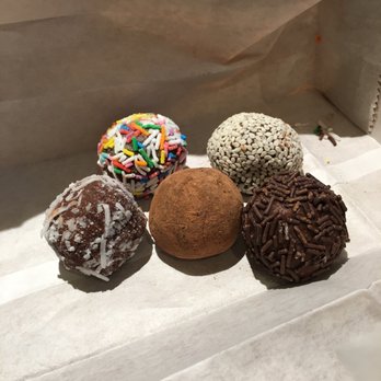 Falafel Yoni - Chocolate tahini balls. Five different garnishes. Sprinkles (chocolate or rainbow), cocoa powder, coconut, and sesame) - Falafel Near Me - Montreal, Quebec Falafel Yoni - Chocolate tahini balls. Five different garnishes. Sprinkles (chocolate or rainbow), cocoa powder, coconut, and sesame) - Falafel Near Me - Montreal, Quebec
