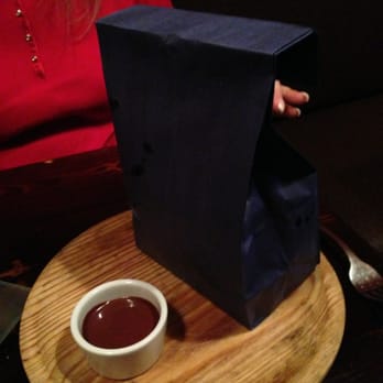 The Cuban - What's in the bag, delectable churros especially made for dipping in that dark chocolate with orange liqueur, amazing - Cuban Near Me - Hoboken, New Jersey The Cuban - What's in the bag, delectable churros especially made for dipping in that dark chocolate with orange liqueur, amazing - Cuban Near Me - Hoboken, New Jersey