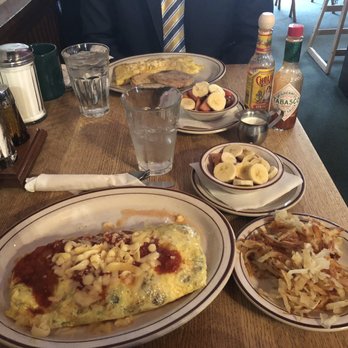 The Courier Cafe - Spanish and cheese omelette, hash browns, fruit - Breakfast & Brunch Near Me - Urbana, Illinois The Courier Cafe - Spanish and cheese omelette, hash browns, fruit - Breakfast & Brunch Near Me - Urbana, Illinois