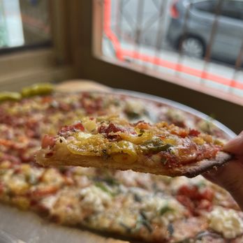 Novel Pizza Cafe - Pizza Near Me - Chicago, Illinois