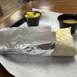 Beef Shawarma - Sandwich and house sauce. Beef Shawarma - Sandwich and house sauce.