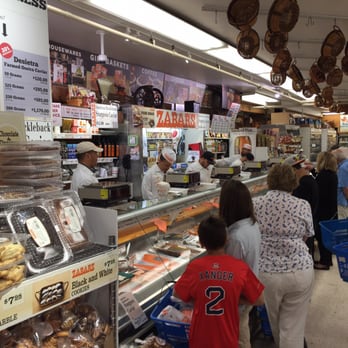 Zabar's - Ever so thinly slicing smoked fish under the watchful eye of their highly demanding customers - Bakeries Near Me - New York, New York Zabar's - Ever so thinly slicing smoked fish under the watchful eye of their highly demanding customers - Bakeries Near Me - New York, New York