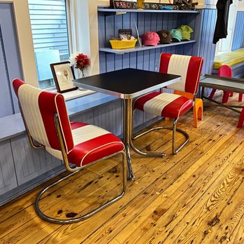 Reasons To be Cheerful - a table and chairs - Ice Cream & Frozen Yogurt Near Me - West Concord, Massachusetts Reasons To be Cheerful - a table and chairs - Ice Cream & Frozen Yogurt Near Me - West Concord, Massachusetts