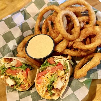 Beaver Creek Bar & Grill - Fried Chicken Wrap with Tiger sauce and onion rings. - Bars Near Me - Shelby, North Carolina Beaver Creek Bar & Grill - Fried Chicken Wrap with Tiger sauce and onion rings. - Bars Near Me - Shelby, North Carolina