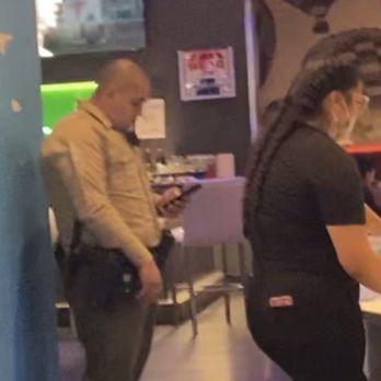 Dave & Buster's Albuquerque - Guard playing on his phone and not wearing a mask - American Near Me - Albuquerque, New Mexico Dave & Buster's Albuquerque - Guard playing on his phone and not wearing a mask - American Near Me - Albuquerque, New Mexico