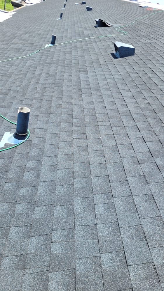 Slide of LTZ Roofing Pros