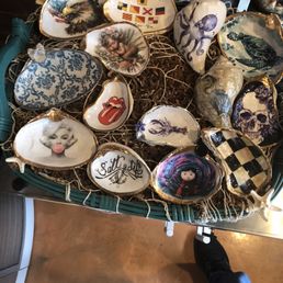 Beautifully decorated and painted seashells, are sold at the reception area Beautifully decorated and painted seashells, are sold at the reception area