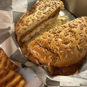 Bar Bill Tavern - Chubby chicken sandwich served with waffle fries - Pubs Near Me - East Aurora, New York