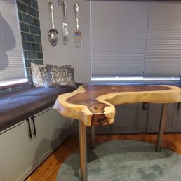 Finally found a slab (monkey pod wood) table in the perfect size and shape for our banquet seating area.