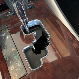 Damaged stick shift cover.