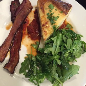 Vovomeena - Tortilla Espanola, Spanish style egg and potato pie with roasted spicy tomatoes underneath and arugula with a lemon olive oil vinaigrette. - Coffee & Tea Near Me - Phoenix, Arizona Vovomeena - Tortilla Espanola, Spanish style egg and potato pie with roasted spicy tomatoes underneath and arugula with a lemon olive oil vinaigrette. - Coffee & Tea Near Me - Phoenix, Arizona