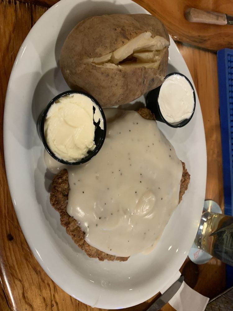 Buster's Restaurant & Saloon Logo