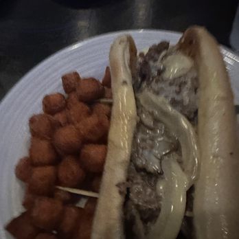 Play Sporting Lounge - Philly cheesesteak with sweet potato tots - Sports Bars Near Me - Hollywood, Florida Play Sporting Lounge - Philly cheesesteak with sweet potato tots - Sports Bars Near Me - Hollywood, Florida