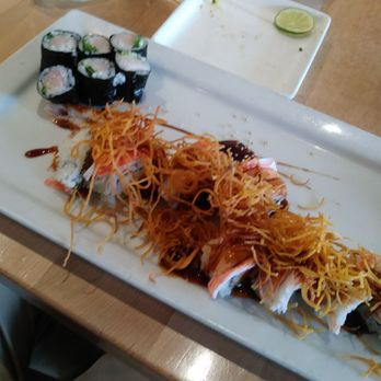 Jaku Sushi - Hamachi and scallion roll and iceland volcano roll with fried sweet potato strings on top - Sushi Bars Near Me - Caledonia, Michigan Jaku Sushi - Hamachi and scallion roll and iceland volcano roll with fried sweet potato strings on top - Sushi Bars Near Me - Caledonia, Michigan
