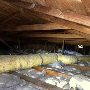 Attic Pros - Before - 30+ year old insulation in the attic - Pest Control Near Me - Oakland, California