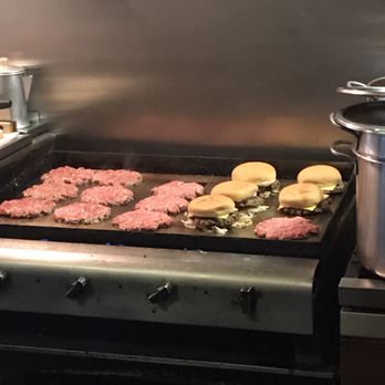 The Brick - hamburgers being cooked on the stove - Burgers Near Me - Jonesville, Indiana The Brick - hamburgers being cooked on the stove - Burgers Near Me - Jonesville, Indiana