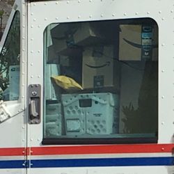 US Post Office - Blocked window and asking for someone to break in with packages inside just asking for trouble