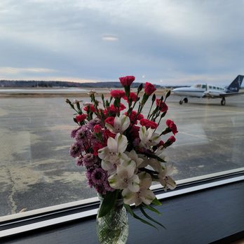 Thai With Us - Window seat at the restaurant facing the airport. - Thai Near Me - Augusta, Maine