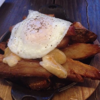 Bosscat Kitchen & Libations - Pouting pork belly egg fries - New American Near Me - Irvine, California Bosscat Kitchen & Libations - Pouting pork belly egg fries - New American Near Me - Irvine, California