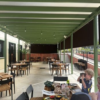 Saludos - Our table in the sun; empty patio from 4-6pm - Mexican Near Me - New Braunfels, Texas
