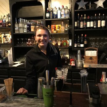 Local Station - Kelsie at the bar made a perfect Negroni. - Cocktail Bars Near Me - Braselton, Georgia Local Station - Kelsie at the bar made a perfect Negroni. - Cocktail Bars Near Me - Braselton, Georgia