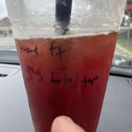 Watermelon tea with mango poppers and boba Watermelon tea with mango poppers and boba