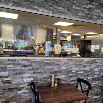 Taso's Greek Taverna - Big window to view action in the kitchen - Greek Near Me - Delray Beach, Florida