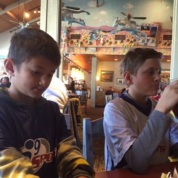 The Range Cafe - Great decor surrounds us as we enjoy our beverages. My boy on the right is enjoying a Cowboy Bob soda with extra cherries! - Mexican Near Me - Albuquerque, New Mexico