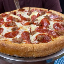 Family’s Pizza & Grinders - Sausage & pepperoni pizza