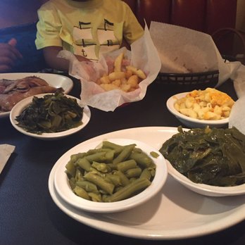 The Reggae Grill - Our lunch: fried drummettes, green beans, kale, fries, fried whiting, baked chicken and red rice. - Caribbean Near Me - Cayce, South Carolina The Reggae Grill - Our lunch: fried drummettes, green beans, kale, fries, fried whiting, baked chicken and red rice. - Caribbean Near Me - Cayce, South Carolina
