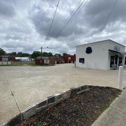 Cafe Belli - Outside, some patio dining and a private parking lot