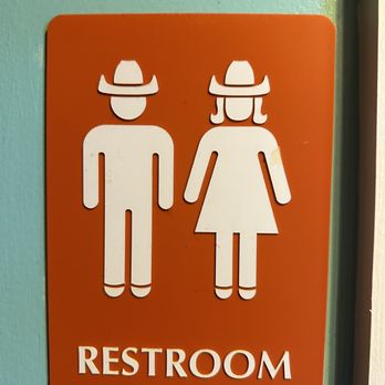 Poke-Poke - a man and woman restroom sign - Seafood Near Me - Austin, Texas Poke-Poke - a man and woman restroom sign - Seafood Near Me - Austin, Texas