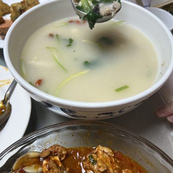 Wai Po Ren Jia - a bowl of soup and a spoon of soup - Chinese Near Me - Queens, New York Wai Po Ren Jia - a bowl of soup and a spoon of soup - Chinese Near Me - Queens, New York