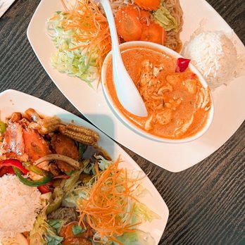 Panwa Thai - two plates of food on a table - Thai Near Me - Seattle, Washington Panwa Thai - two plates of food on a table - Thai Near Me - Seattle, Washington