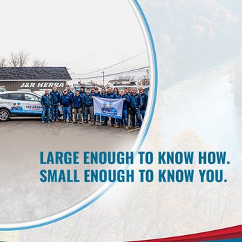 J&R Herra Heating, Cooling, & Plumbing - a group of people holding a banner - Plumbing Near Me - Elburn, Illinois J&R Herra Heating, Cooling, & Plumbing - a group of people holding a banner - Plumbing Near Me - Elburn, Illinois