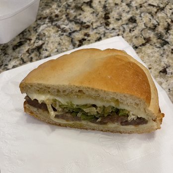 Sourdough Bread Deli - Half of a sausage with peppers sandwich. - New American Near Me - Plano, Texas Sourdough Bread Deli - Half of a sausage with peppers sandwich. - New American Near Me - Plano, Texas