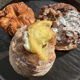 Yuzu Custard Puffin, kouign aman and bostock (I believe blood orange almond chocolate). Yuzu Custard Puffin, kouign aman and bostock (I believe blood orange almond chocolate).