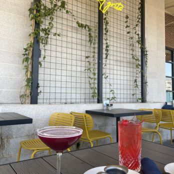 Tupelo Honey Southern Kitchen & Bar - Purple people eater & Dirty Shirley on the out on the patio - New American Near Me - Irving, Texas Tupelo Honey Southern Kitchen & Bar - Purple people eater & Dirty Shirley on the out on the patio - New American Near Me - Irving, Texas