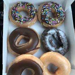 Chocolate frosted, chocolate frosted with sprinkles, chocolate glazed cake and original glaze.