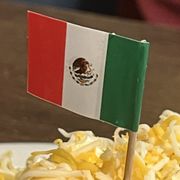Photo of La Especial Norte - Encinitas, CA, United States. A tiny flag sticking out of their namesake plate.